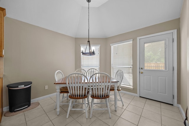 16511 Crystal View Ct, Houston, TX 77095 - dining area featuring baseboards, an inviting chandelier, and light tile patterned floors