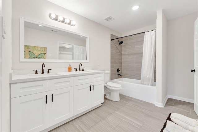 full bathroom with shower / bath combo with shower curtain, a sink, visible vents, and double vanity