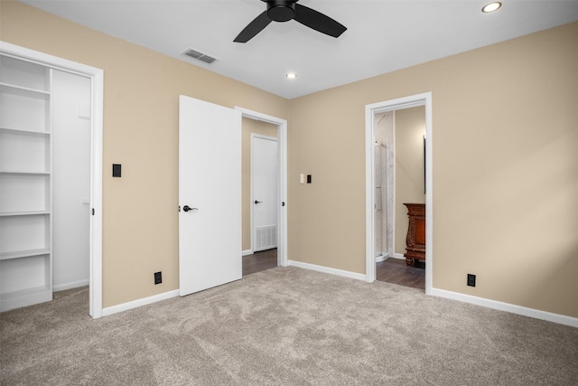 106 Rosewood Dr, Crockett, TX 75835 - unfurnished bedroom featuring carpet, visible vents, recessed lighting, and a closet