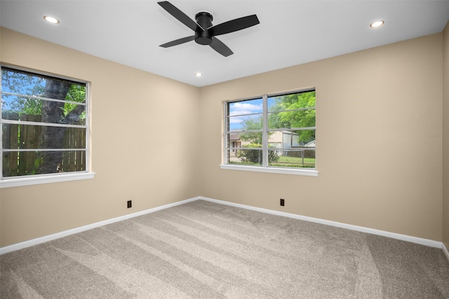 106 Rosewood Dr, Crockett, TX 75835 - carpeted spare room with a wealth of natural light, ceiling fan, recessed lighting, and baseboards