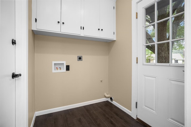 106 Rosewood Dr, Crockett, TX 75835 - washroom featuring cabinet space, dark wood-type flooring, hookup for a washing machine, electric dryer hookup, and baseboards