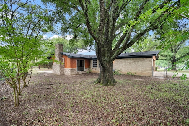 106 Rosewood Dr, Crockett, TX 75835 - exterior space featuring fence and a chimney