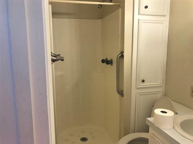 104 Bayside St, Livingston, TX 77351 - full bath with a stall shower, toilet, and vanity