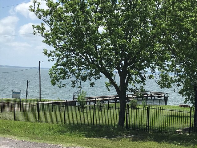 104 Bayside St, Livingston, TX 77351 - view of yard with fence and a water view