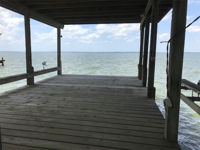 104 Bayside St, Livingston, TX 77351 - view of dock featuring a water view and boat lift