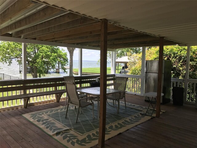 104 Bayside St, Livingston, TX 77351 - deck with outdoor dining space and a water view