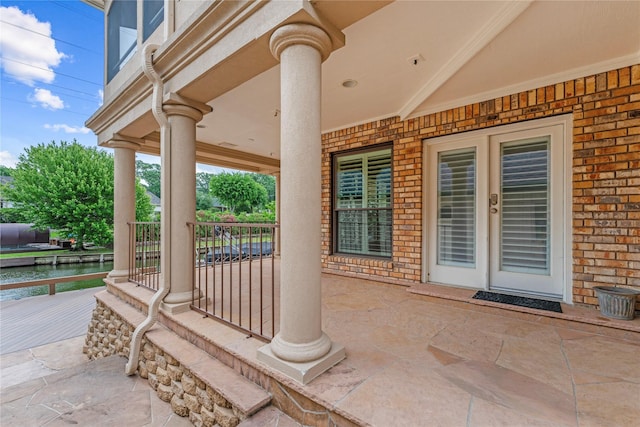 view of patio featuring a porch