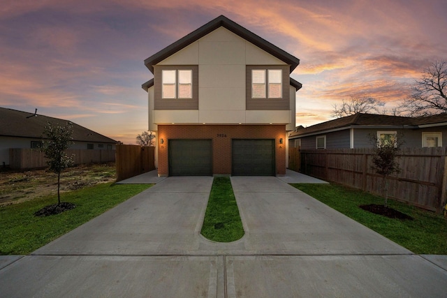 view of front of property with brick siding, fence, a garage, driveway, and a lawn