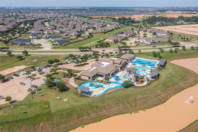 birds eye view of property with a residential view