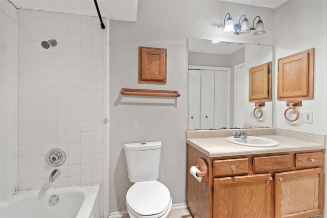 full bathroom with toilet, tub / shower combination, and vanity