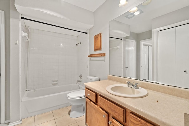 full bath featuring toilet, tile patterned flooring, shower / washtub combination, and vanity
