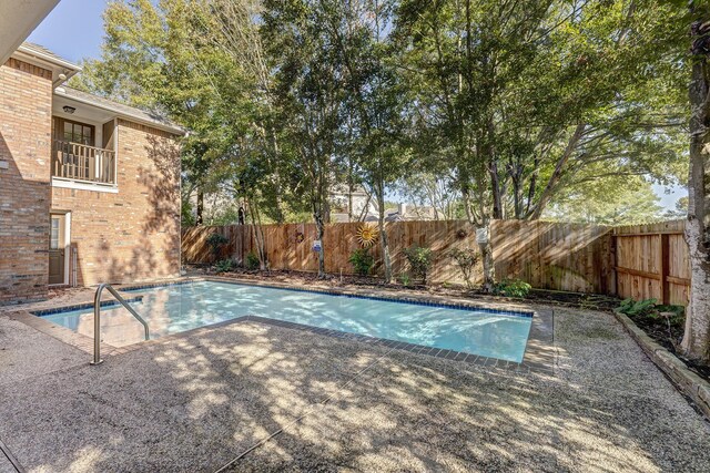 5102 Danebridge Dr, Houston, TX 77084 - view of swimming pool with a fenced backyard and a patio