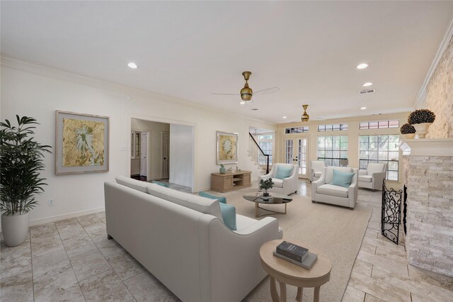 living room featuring visible vents, ceiling fan, recessed lighting, and ornamental molding