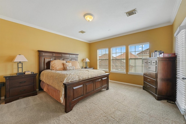 bedroom with visible vents, crown molding, and light carpet