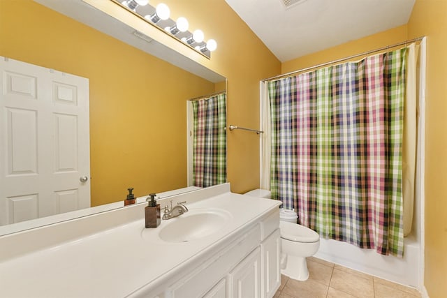 bathroom featuring vanity, visible vents, toilet, tile patterned floors, and shower / tub combo