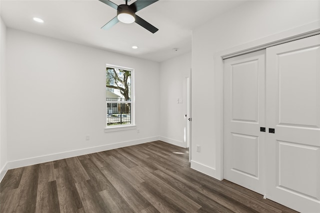 2707 Dennis St, Houston, TX 77004 - unfurnished bedroom featuring recessed lighting, baseboards, dark wood finished floors, and a closet