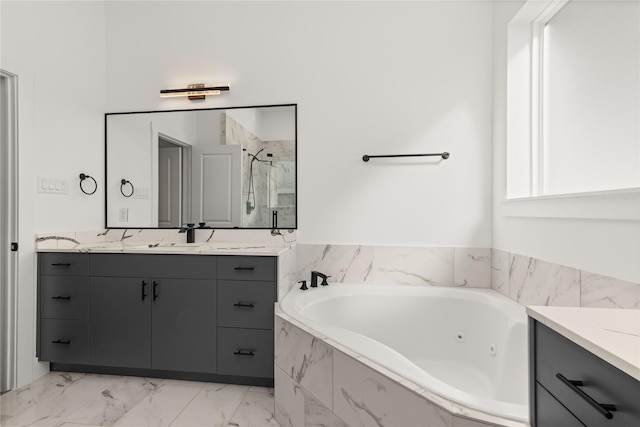2707 Dennis St, Houston, TX 77004 - full bath with vanity, a marble finish shower, a jetted tub, and marble finish floor