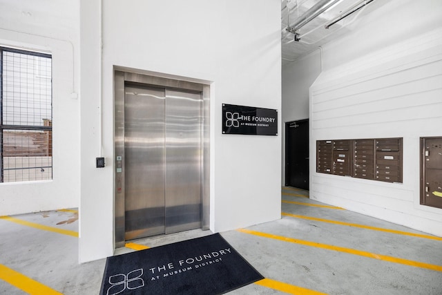 view of exterior entry featuring elevator