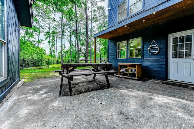 view of patio with fence