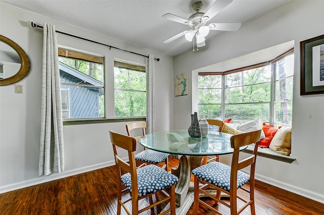dining area featuring ceiling fan, wood finished floors, and baseboards