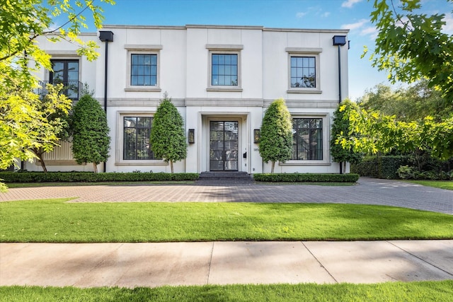 3851 Chevy Chase Dr, Houston, TX 77019 - view of front of house featuring french doors, stucco siding, and a front yard