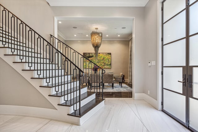 3851 Chevy Chase Dr, Houston, TX 77019 - foyer featuring stairway, a notable chandelier, marble finish floor, baseboards, and french doors