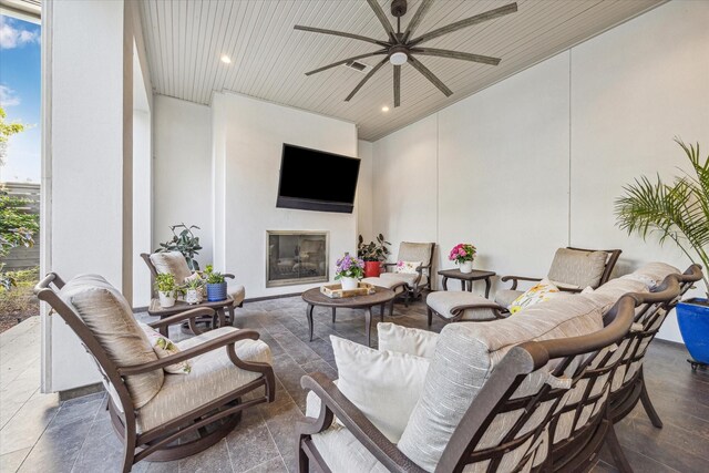 3851 Chevy Chase Dr, Houston, TX 77019 - living area with recessed lighting, ceiling fan, and a glass covered fireplace