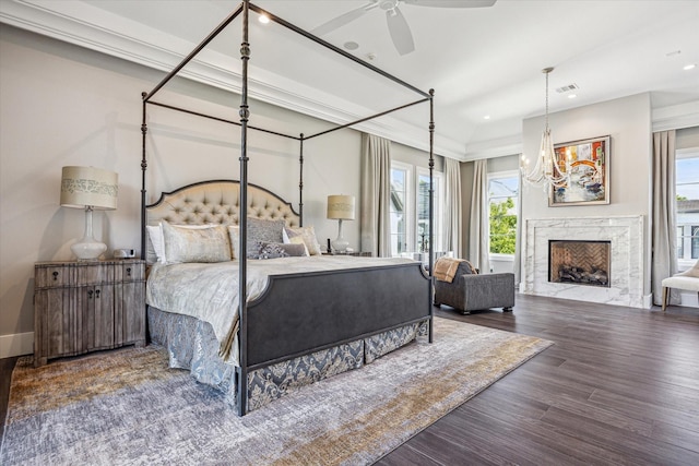 3851 Chevy Chase Dr, Houston, TX 77019 - bedroom featuring multiple windows, wood finished floors, and visible vents