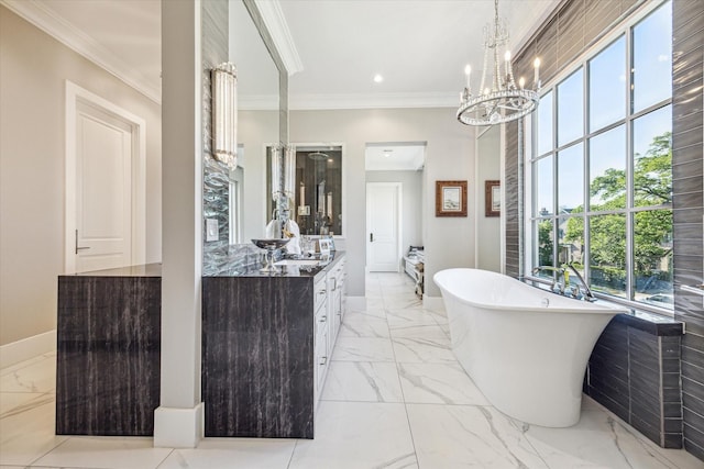 3851 Chevy Chase Dr, Houston, TX 77019 - bathroom featuring vanity, a notable chandelier, marble finish floor, baseboards, and a soaking tub