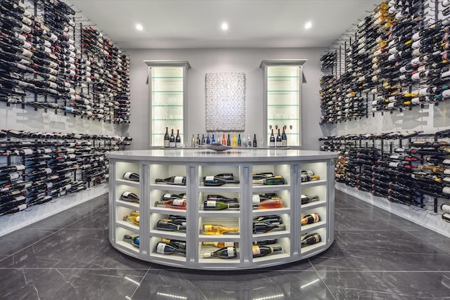 3851 Chevy Chase Dr, Houston, TX 77019 - wine room with recessed lighting and marble finish floor
