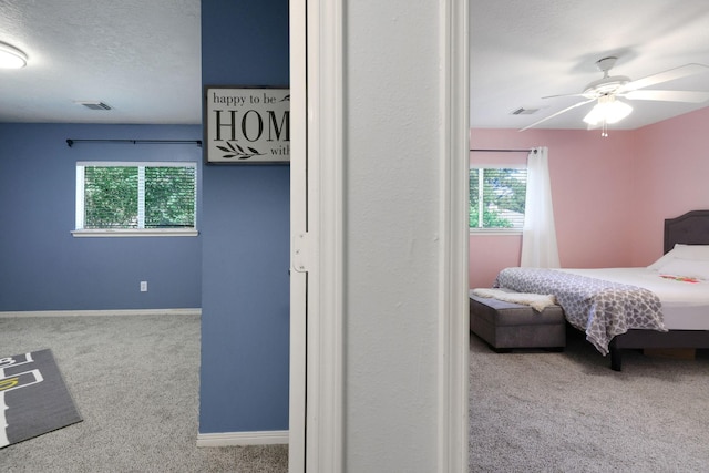 3739 Apple Hollow Ln, Humble, TX 77396 - bedroom with carpet flooring, baseboards, and a textured ceiling