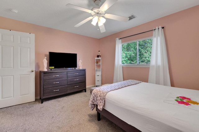 3739 Apple Hollow Ln, Humble, TX 77396 - bedroom featuring light carpet, a ceiling fan, and baseboards