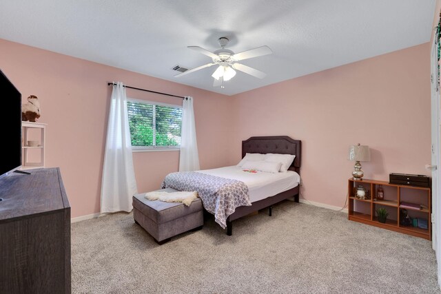 3739 Apple Hollow Ln, Humble, TX 77396 - bedroom featuring carpet floors, ceiling fan, and baseboards