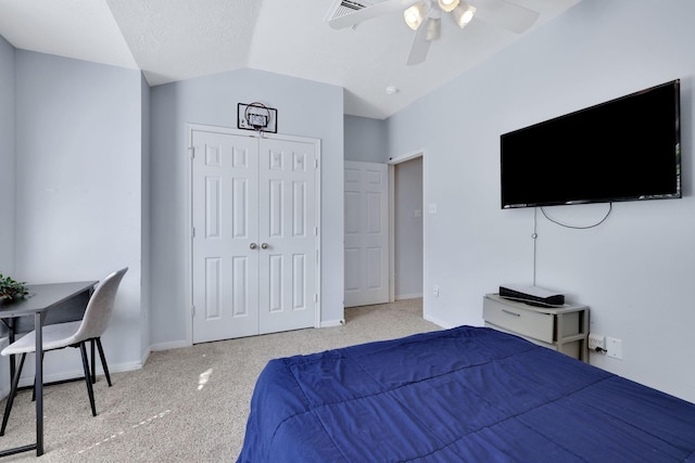 3739 Apple Hollow Ln, Humble, TX 77396 - bedroom with carpet flooring, a closet, vaulted ceiling, baseboards, and a ceiling fan