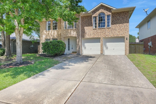 3739 Apple Hollow Ln, Humble, TX 77396 - view of front of house featuring concrete driveway, brick siding, and an attached garage