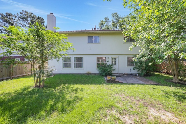 3739 Apple Hollow Ln, Humble, TX 77396 - back of house with a patio area and a chimney