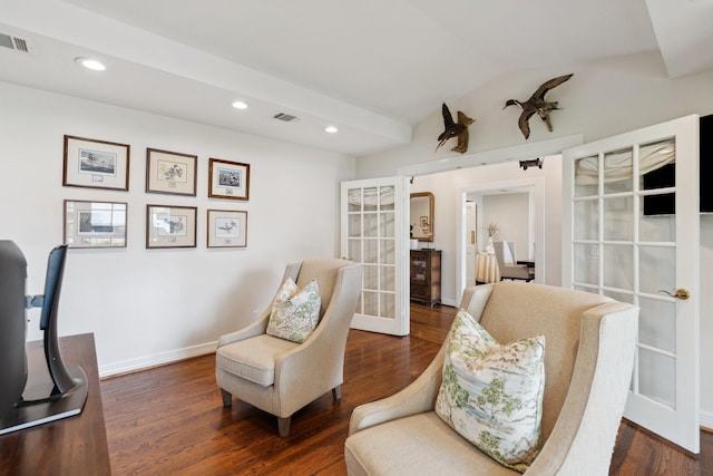 living area featuring dark wood-style flooring, visible vents, french doors, and recessed lighting