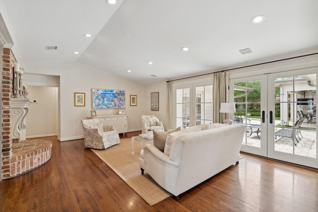 living room with french doors, visible vents, wood finished floors, lofted ceiling, and recessed lighting