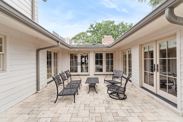 view of patio / terrace featuring french doors