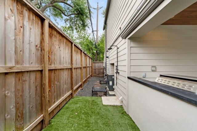 view of property exterior featuring fence