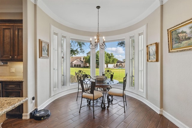 90 Greenview St, Montgomery, TX 77356 - dining room with dark wood-style flooring, baseboards, crown molding, and a chandelier