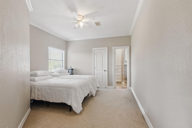 90 Greenview St, Montgomery, TX 77356 - bedroom featuring ornamental molding, light carpet, baseboards, ceiling fan, and ensuite bath