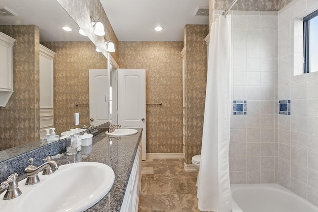 90 Greenview St, Montgomery, TX 77356 - full bathroom featuring toilet, double vanity, and shower / tub combo with curtain