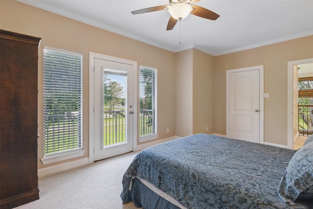 90 Greenview St, Montgomery, TX 77356 - carpeted bedroom with access to exterior, crown molding, baseboards, and a ceiling fan