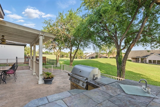 90 Greenview St, Montgomery, TX 77356 - view of patio / terrace with area for grilling, ceiling fan, and a residential view