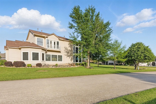 90 Greenview St, Montgomery, TX 77356 - view of front of house with stucco siding and a front yard