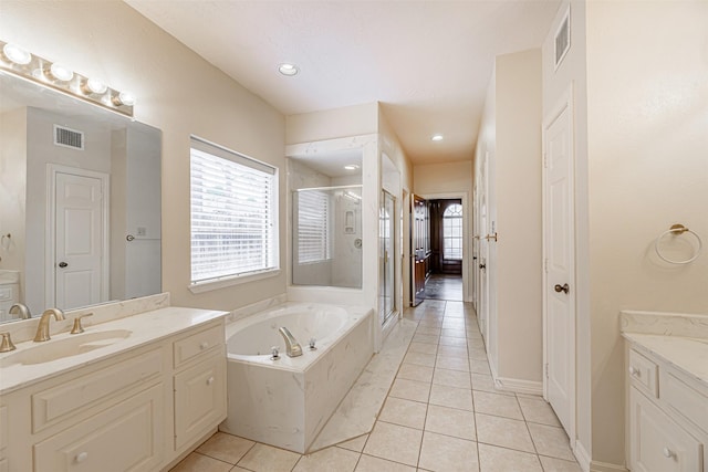 full bath with a shower stall, visible vents, a bath, vanity, and tile patterned flooring
