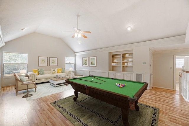 rec room featuring visible vents, ceiling fan, lofted ceiling, and light wood-style flooring