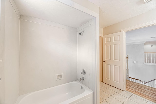 full bath with tile patterned floors and  shower combination
