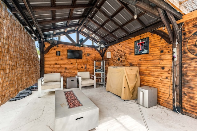 view of patio / terrace with an outdoor fire pit